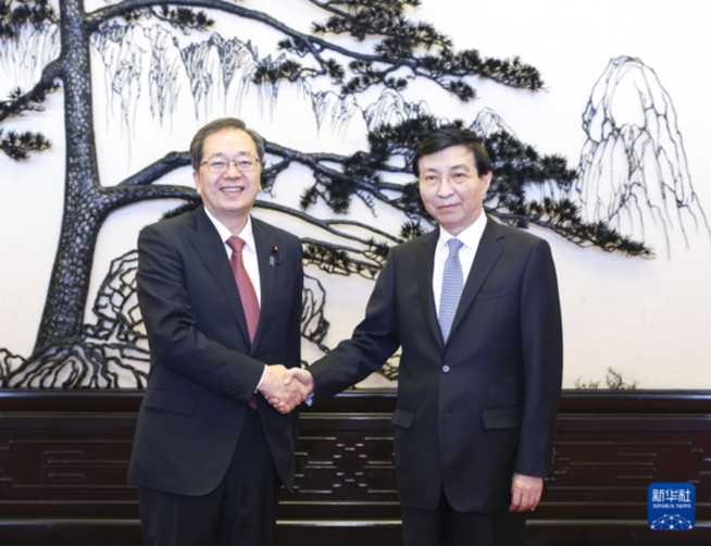 王滬寧會見日本公明黨代表團